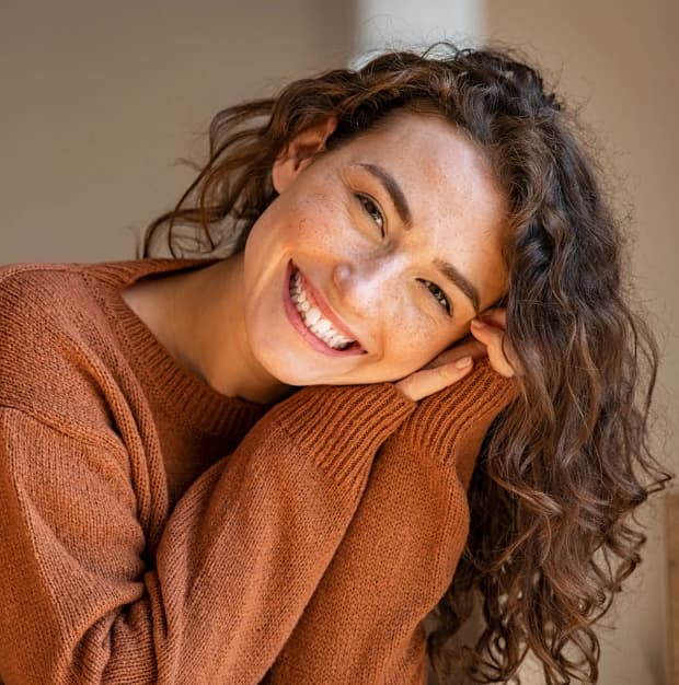 Smiling patient after treatment with a cosmetic dentist in Clearwater, FL
